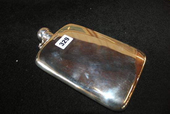 Large modern silver hip flask with bayonet top